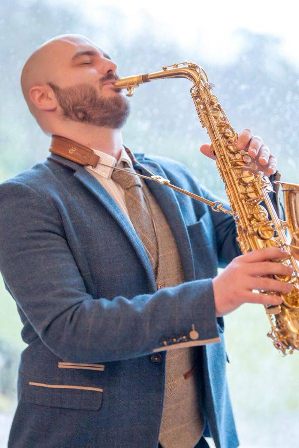 Click to enlarge image suit-and-sax-04.jpg Click to enlarge image suit-and-sax-04.jpg