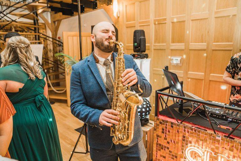 Click to enlarge image suit-and-sax-05.jpg Click to enlarge image suit-and-sax-05.jpg