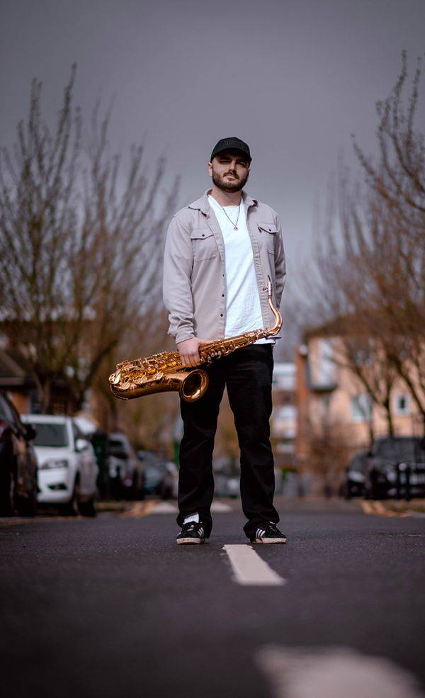 Click to enlarge image suit-and-sax-08.jpg Click to enlarge image suit-and-sax-08.jpg