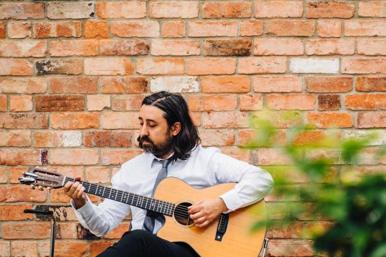 Click to enlarge image ian-guitarist-01.jpg Click to enlarge image ian-guitarist-01.jpg