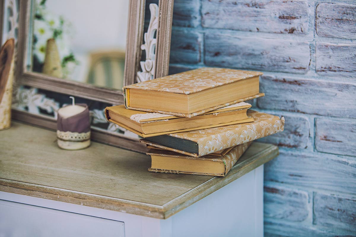 pile of books as wedding decor