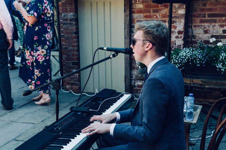 Click to enlarge image sam-pianist-02.jpg