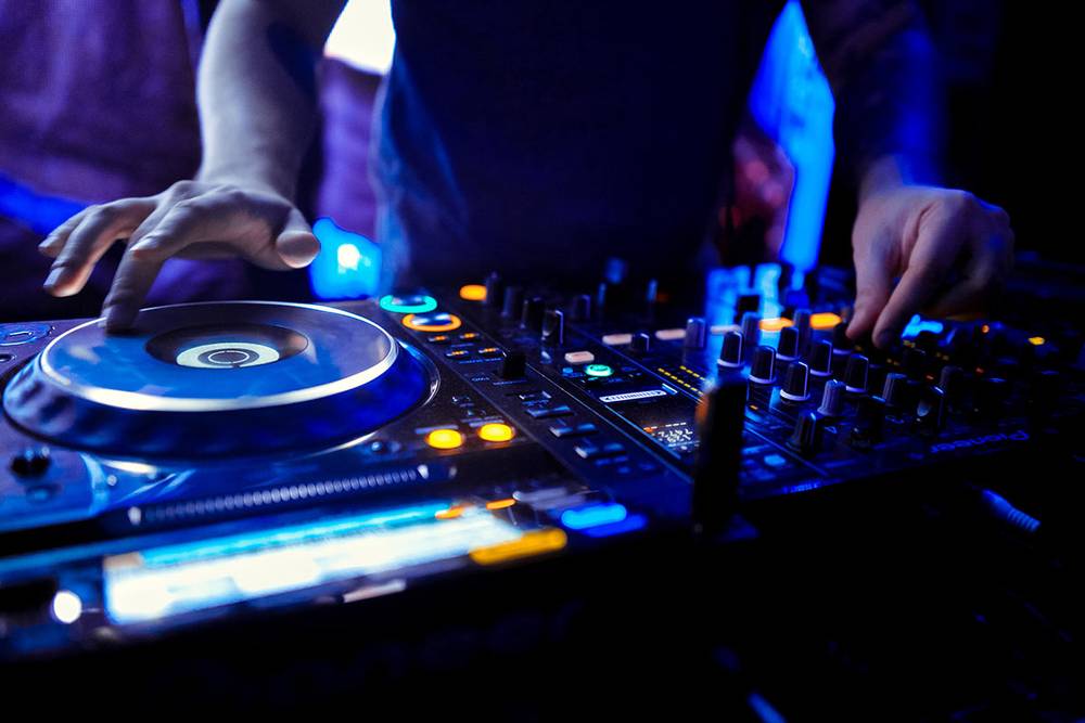 Hire a DJ Near Me | Professional DJs For Hire Across The UK